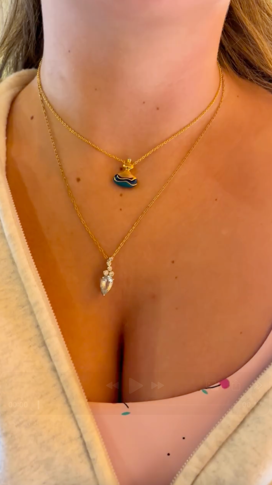 Close-up video of BeamMore jewelry worn in everyday styling.