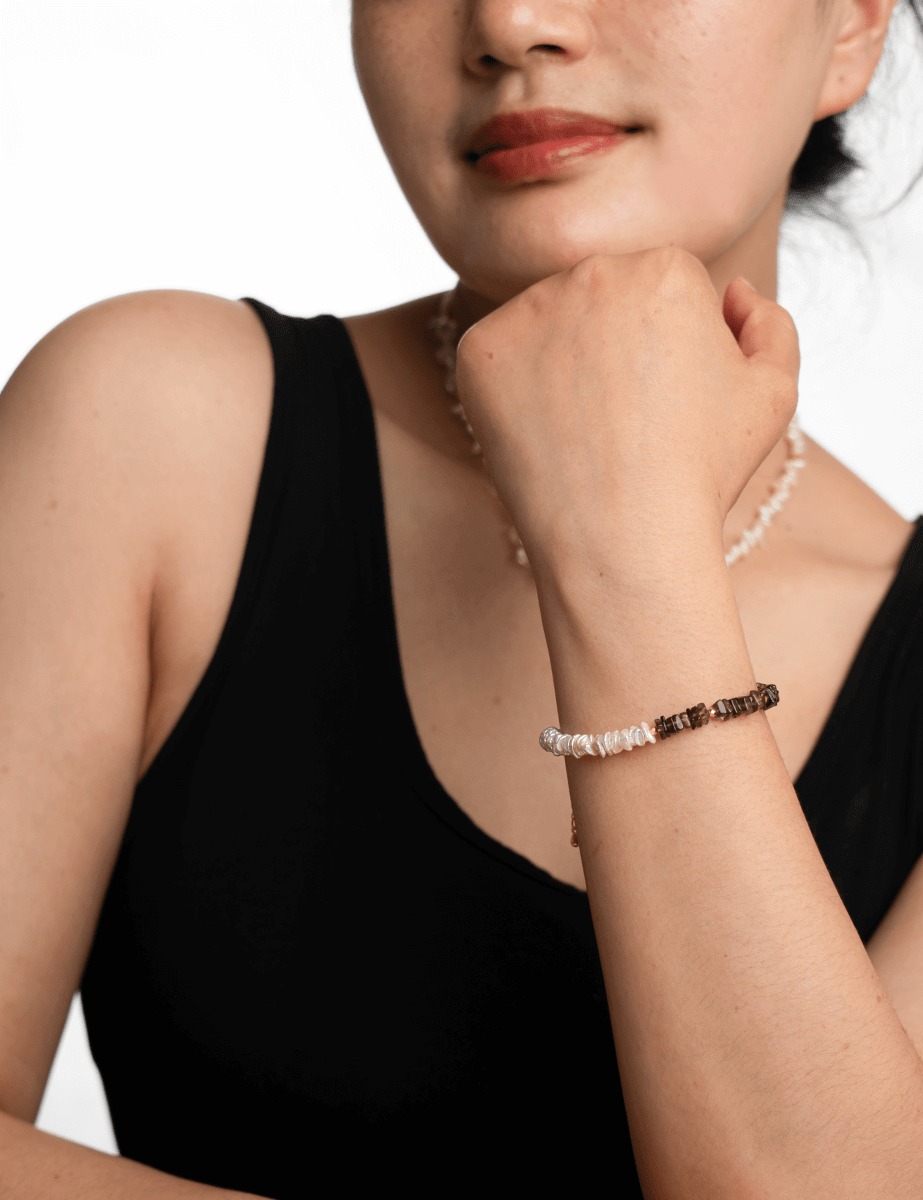 Model wearing BEAMMORE smoky quartz & freshwater pearl beaded bracelet in gold plated sterling silver -Elegant gift for women