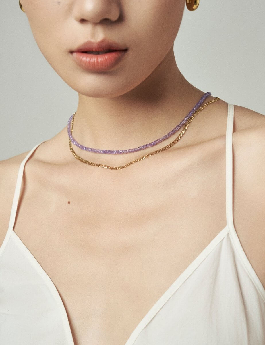 Model wearing BEAMMORE NOVA tanzanite faceted necklace – Minimal, layer-ready style