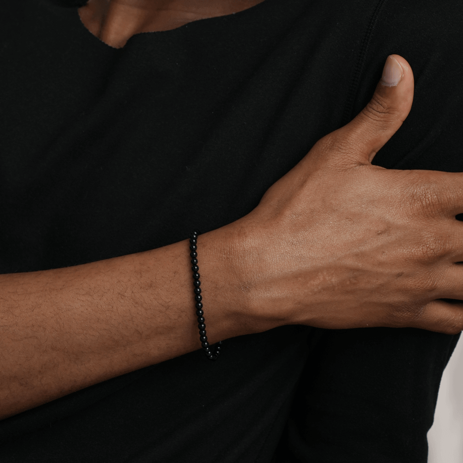 Model wearing BEAMMORE black onyx beaded bracelet – Elegant birthstone jewelry gift for men