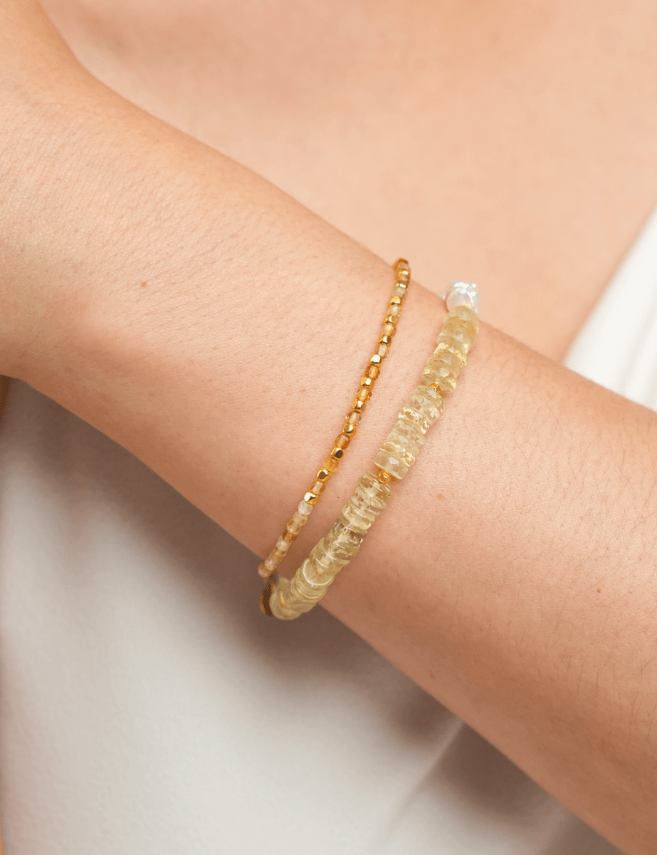 Model wearing BEAMMORE sunstone beaded bracelet – Elegant birthstone jewelry gift for women