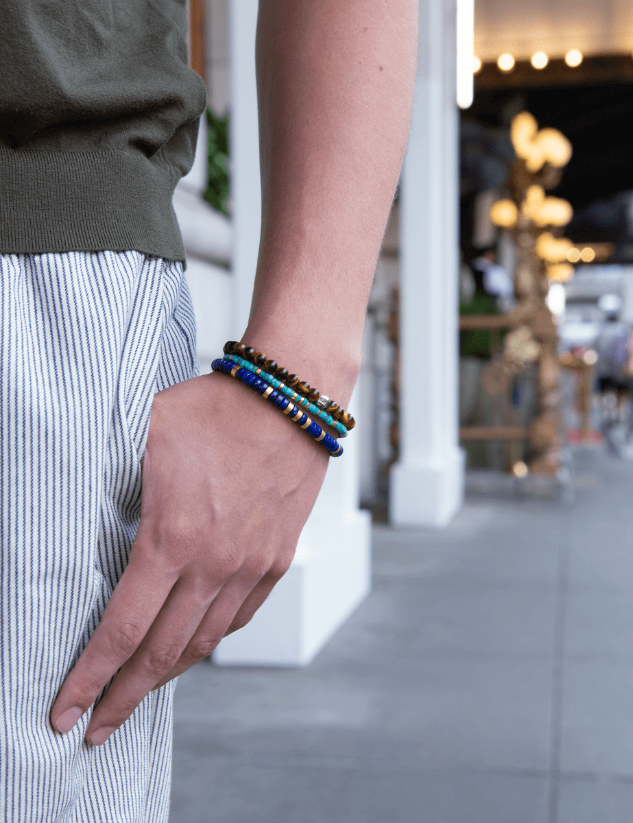 Model wearing BEAMMORE tiger’s eye beaded sterling silver bracelet – Elegant birthstone jewelry gift for men